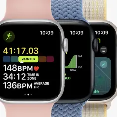 Trzy zegarki Apple Watch z różnymi tarczami: trening, tętno i mapa.
