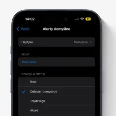 Ustawienia iPhone'a: dźwięki powiadomień. Widoczna opcja "Odbicie (domyślny)" jako wybrany dźwięk alertu.
